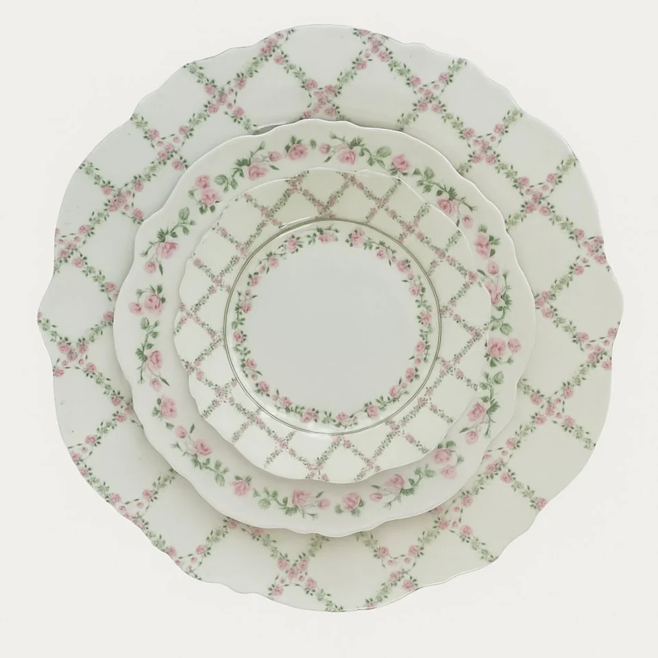 White dinner plate with light grey geometric lattice pattern for elegant tableware rental