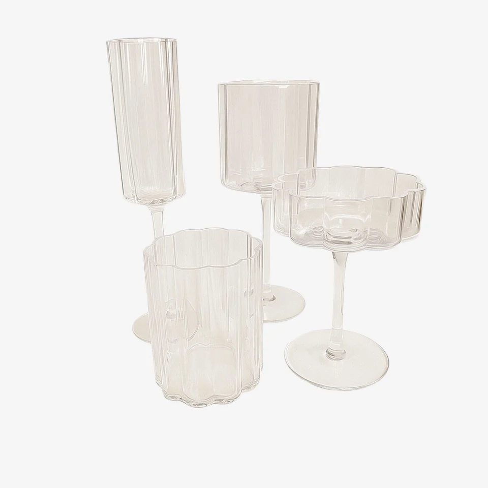 Clear glass goblet set ideal for elegant wedding tablescapes and upscale event rentals.